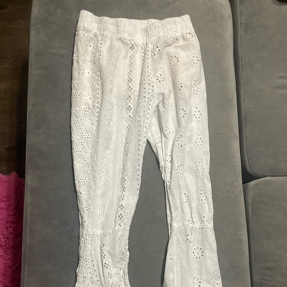 White eyelet flare pants